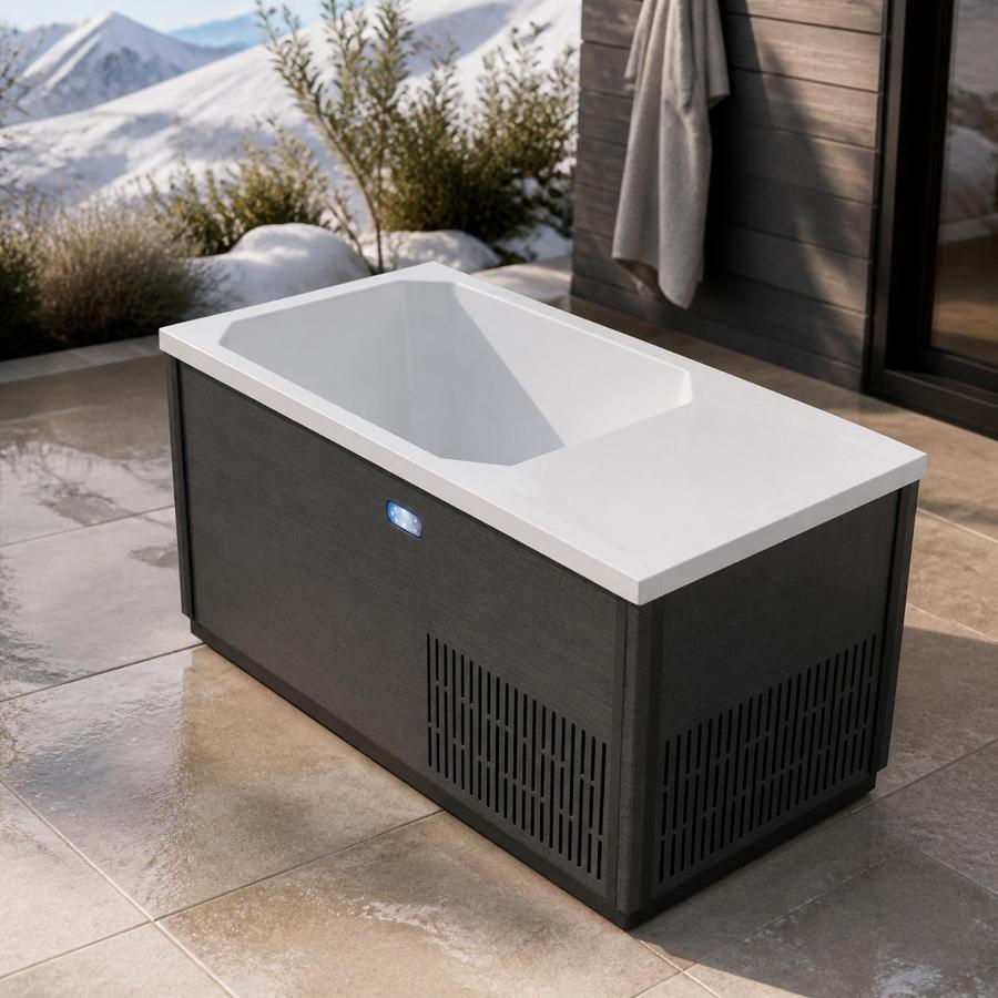 Elevated isometric studio rendering of the C02 cold plunge tub with charcoal cabinet and white acrylic basin