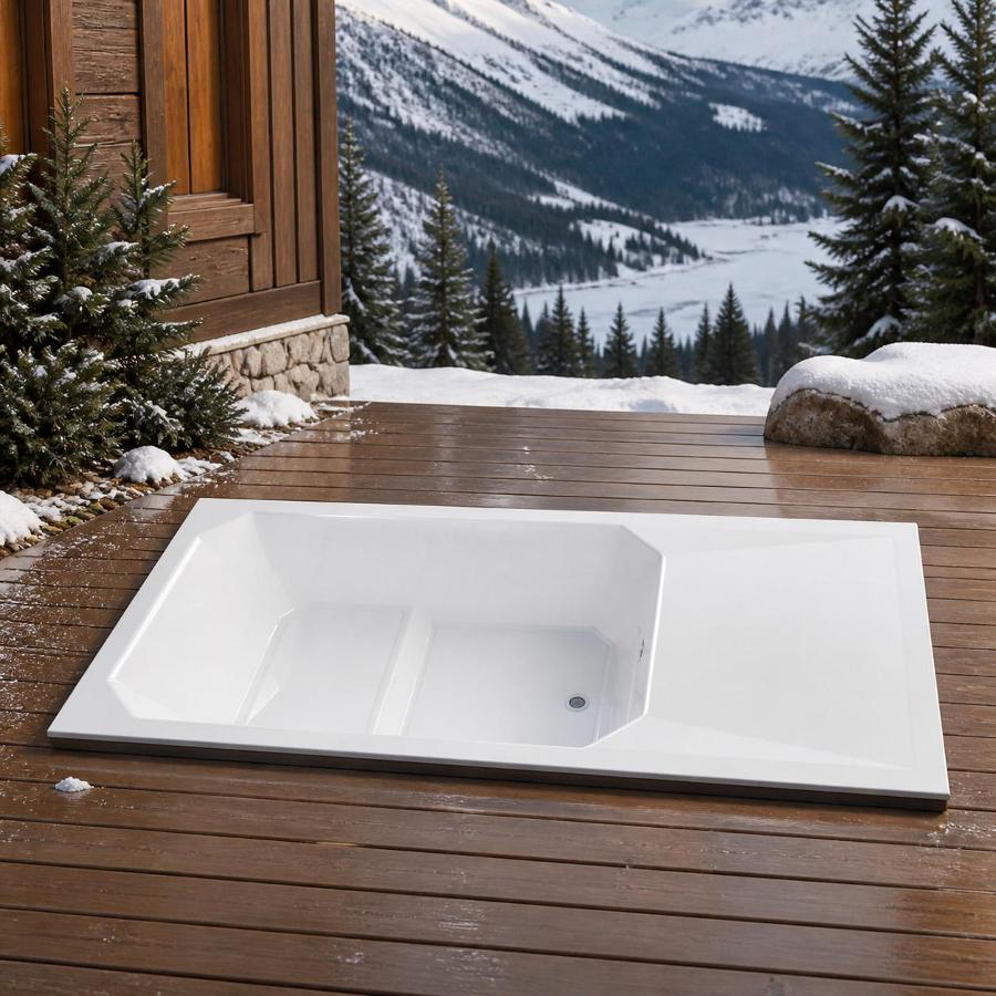 Overhead view of the cold plunge tub basin showing the integrated resting step and drain fitting